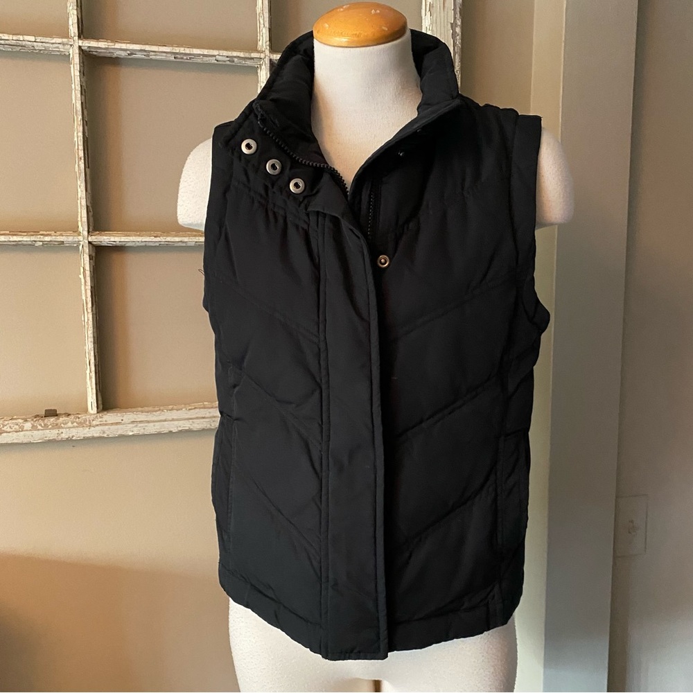 Gap down filled puffer vest.